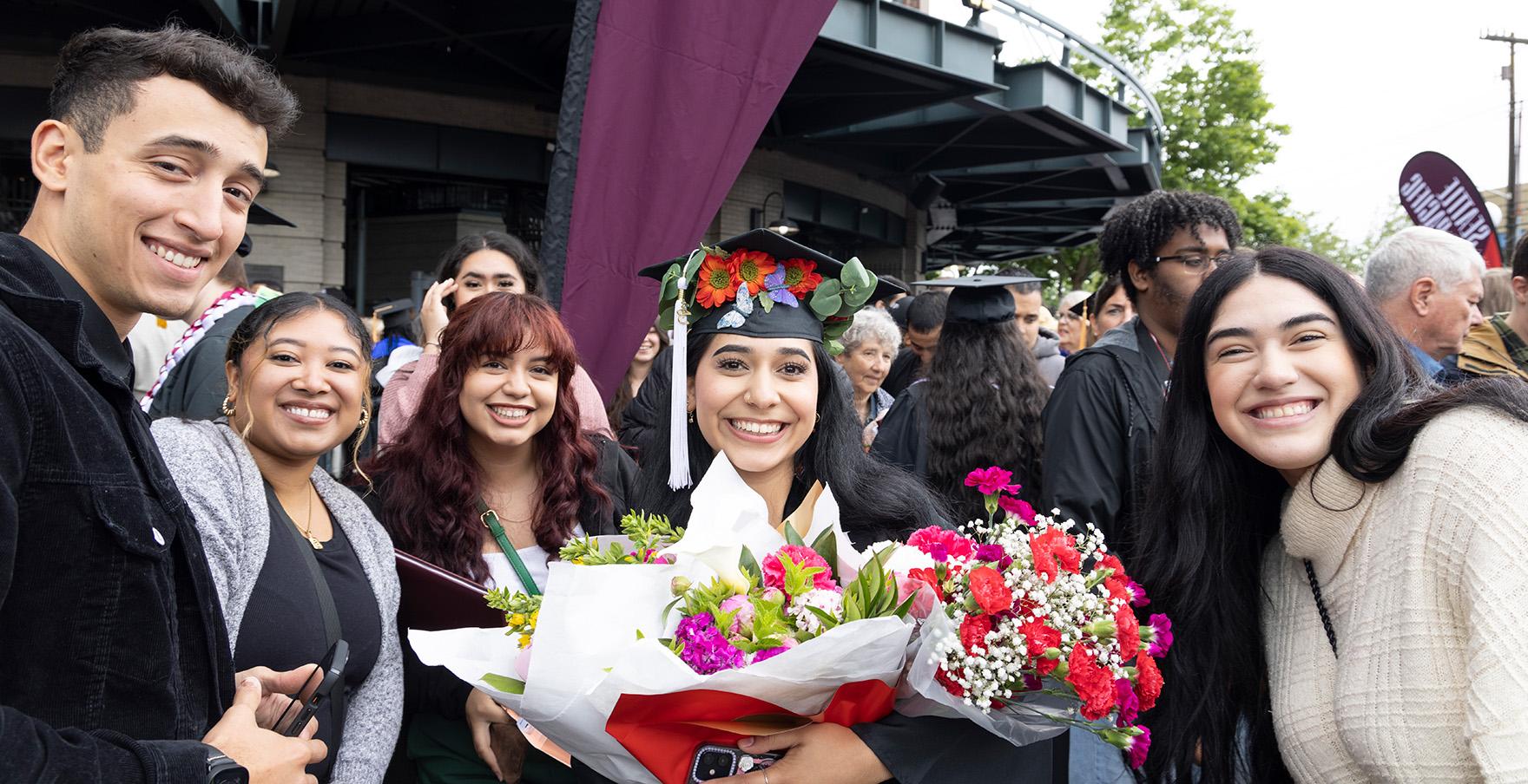 SPU graduates celebrate outside of t - mobile公园 | photo by Mike Siegel